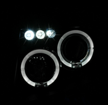 Cargar imagen en el visor de la galería, For 05-08 Nissan Frontier 05-07 Pathfinder Black LED Halo Projector Headlights - NINTE